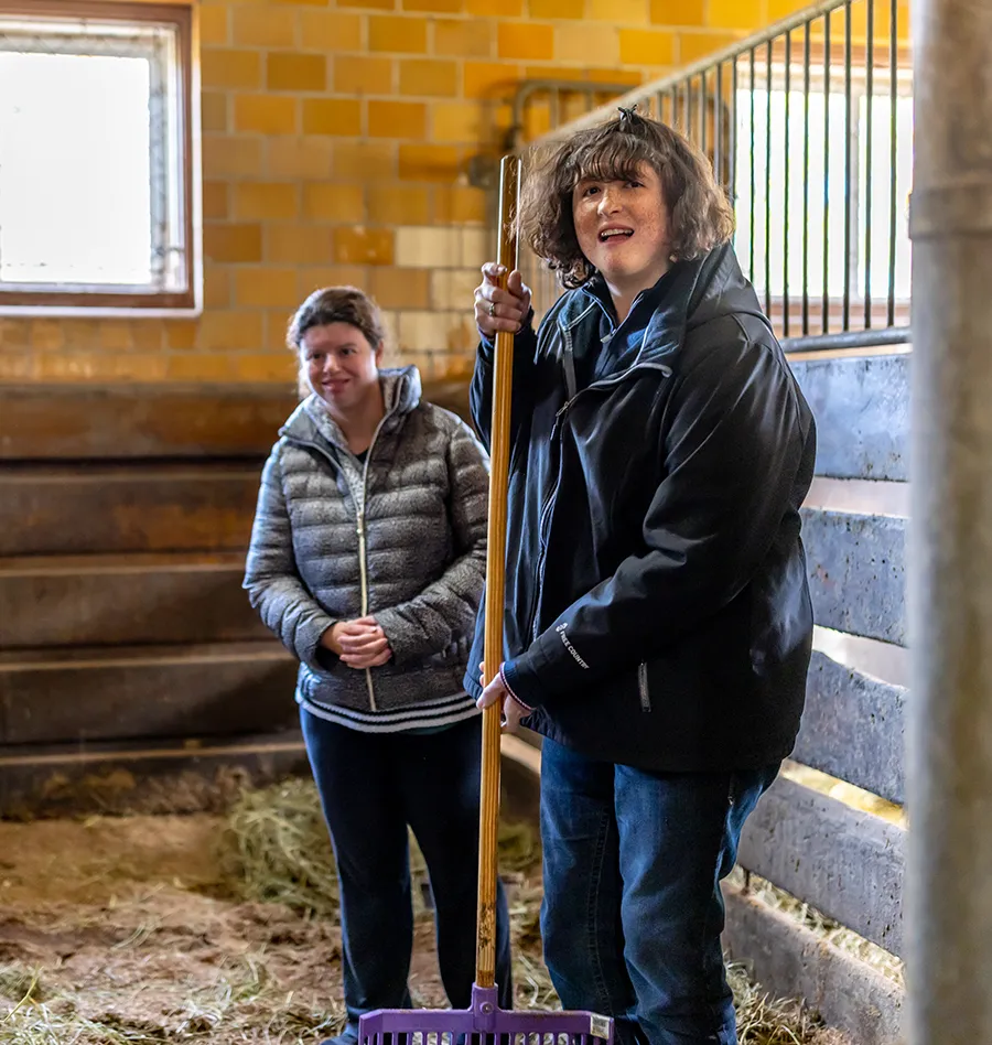 Barn Chores 2 attendees doing Barn Chores